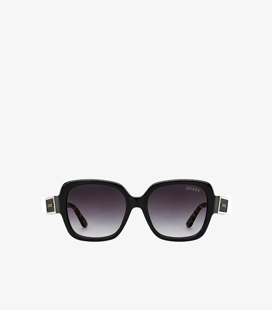 Front view of Guess black square sunglasses featuring dark gradient lenses and gold-tone temple logos