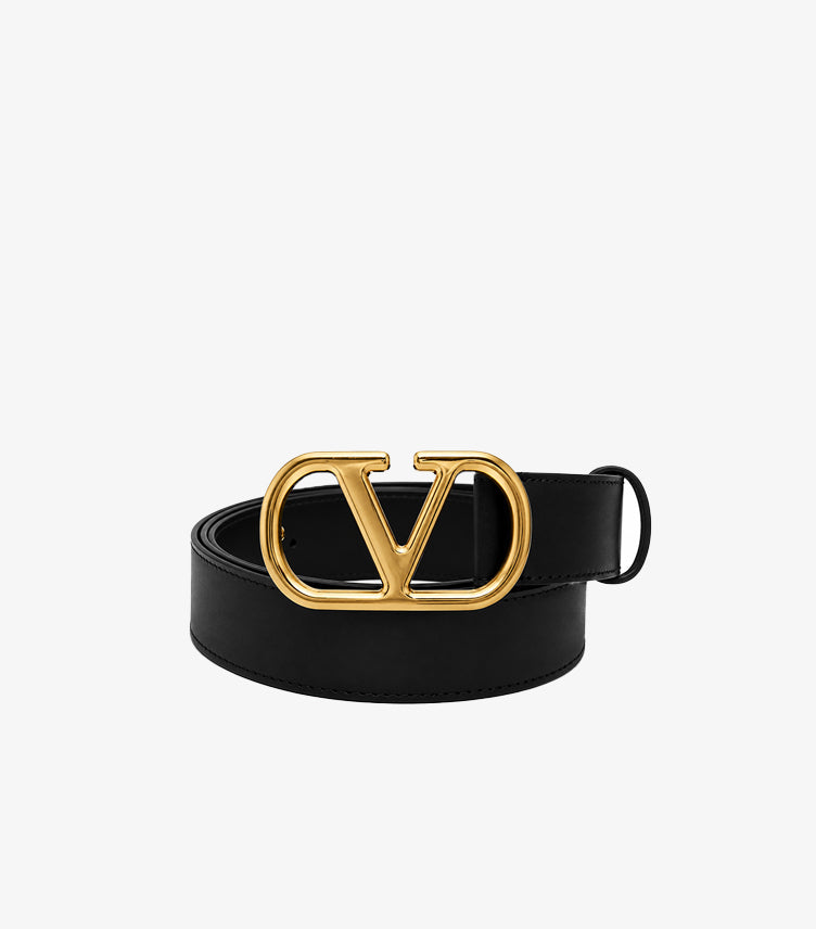 Front view of Valentino Garavani black leather belt with oversized gold-tone VLogo Signature buckle