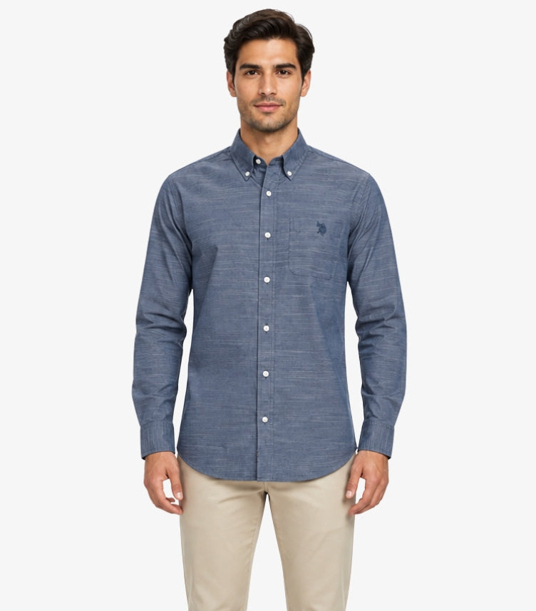 U.S. Polo Assn. men's blue Oxford button-down cotton shirt with long sleeves, embroidered chest logo, and chest pocket, front view.