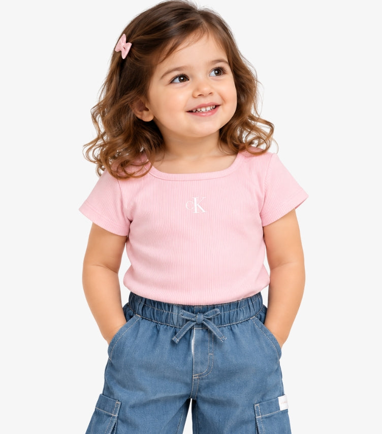 Close-up of Calvin Klein children’s pink CK logo T-shirt and blue elasticated-waist cargo trousers set