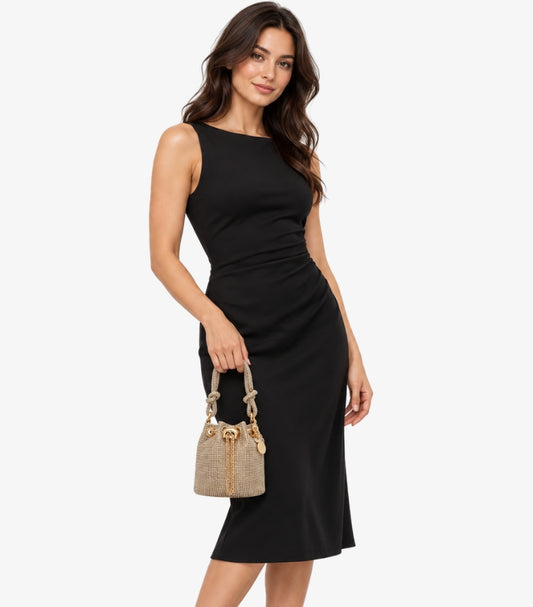 Woman holding ALDO crystal-embellished mini bucket bag with gold-tone drawstring and knotted handle