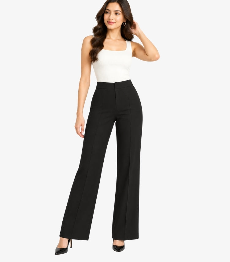 Front view of a model wearing H&M high-waisted wide-leg tailored trousers with vertical seam detailing