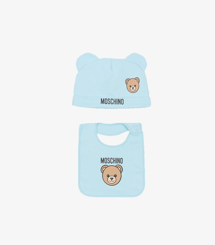 Moschino baby blue teddy bear beanie and matching bib made from soft cotton for newborns.