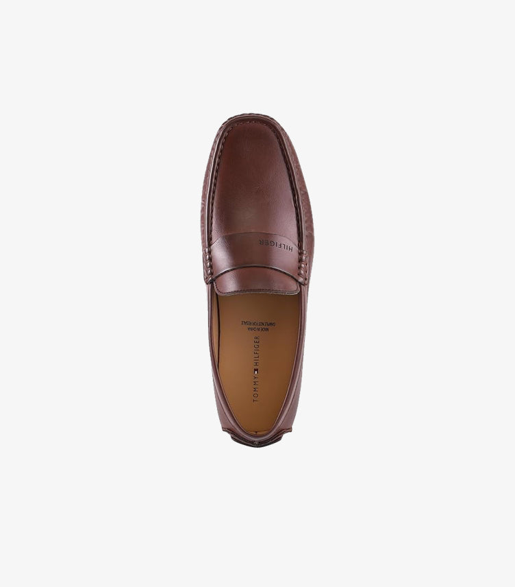 Top view of Tommy Hilfiger men’s leather driving loafer showing the penny strap and rounded moccasin toe
