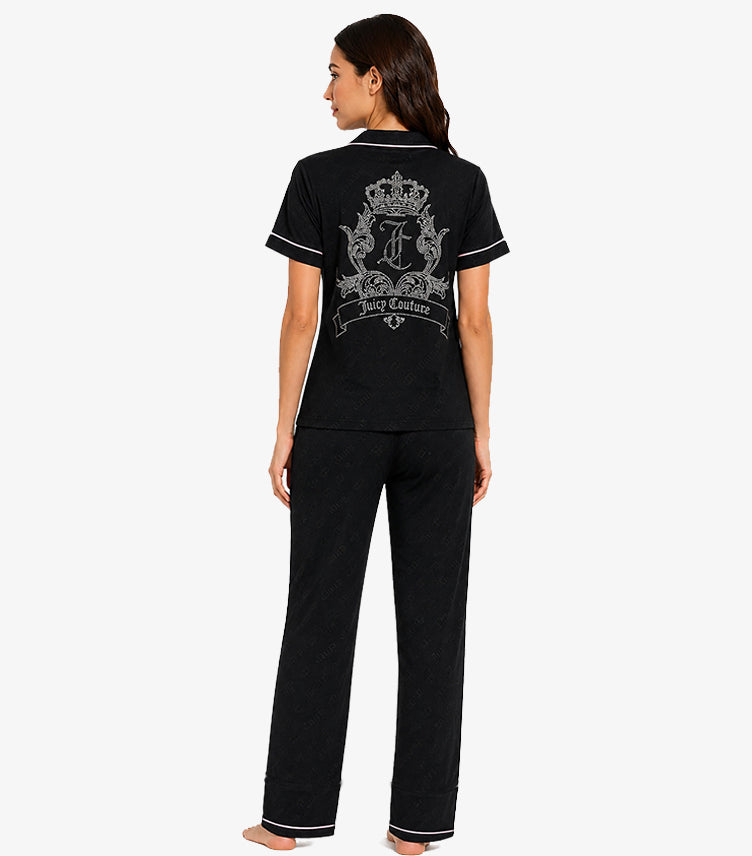Juicy Couture black pajama set back view showing elaborate rhinestone crown crest with JC monogram scrollwork and Juicy Couture banner ribbon