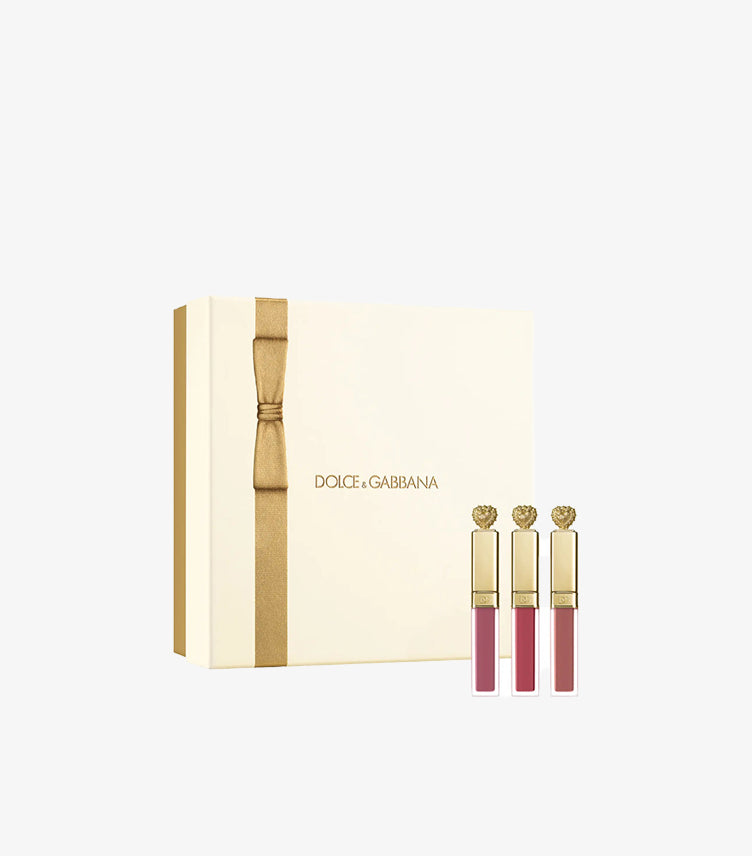 Dolce & Gabbana Devotion Everkiss liquid lipstick gift set featuring three soft matte lipsticks in luxury cream and gold packaging.
