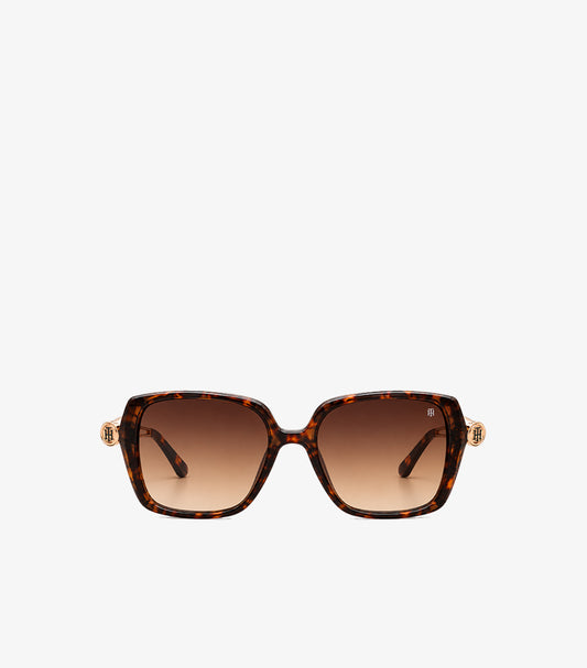 Front view of Tommy Hilfiger oversized square sunglasses featuring tortoiseshell frames, gradient lenses and TH monogram accents