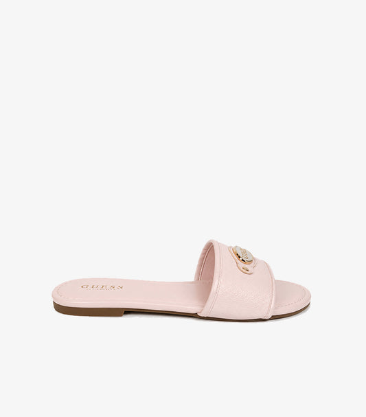 GUESS Los Angeles pink pebbled leather flat slide sandal side profile showing wide strap gold logo hardware and brown outsole