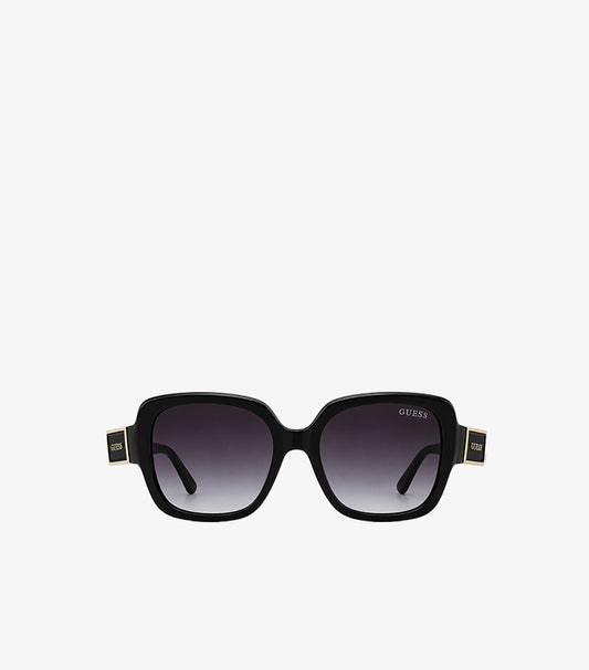 Angled view of Guess black square sunglasses featuring wide arms and gold-tone temple branding