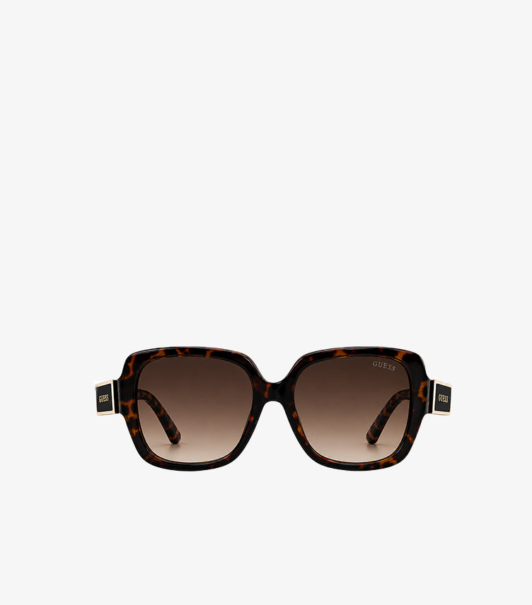 Front view of Guess tortoiseshell square sunglasses featuring brown gradient lenses and gold-tone temple accents
