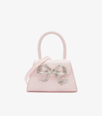 Self-Portrait pink crystal bow mini bag front view showing full baguette bow embellishment and top handle