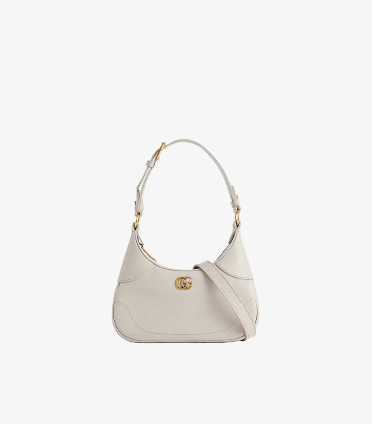 Gucci Aphrodite Small white leather shoulder bag front view with gold hardware and brand plaque