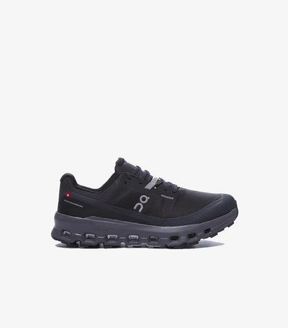 Side view of black On Running waterproof trail shoe with Swiss Engineering detail and CloudTec-style sole pods