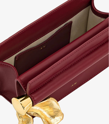 JW PEI HOLLY METAL PENDANT EMBELLISHED CLUTCH
