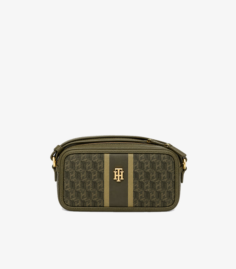 Front view of Tommy Hilfiger olive monogram camera bag with vertical stripe detail, zip closure and gold-tone emblem