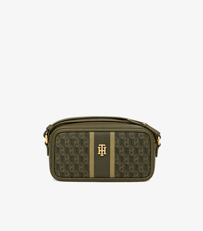 Front view of Tommy Hilfiger olive monogram camera bag with vertical stripe detail, zip closure and gold-tone emblem