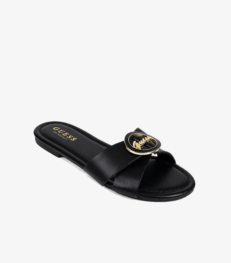 GUESS Women's Black Cross-Strap Flat Slide Sandal with Gold Logo Medallion Angled View