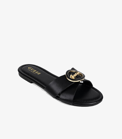 GUESS Women's Black Cross-Strap Flat Slide Sandal with Gold Logo Medallion Angled View