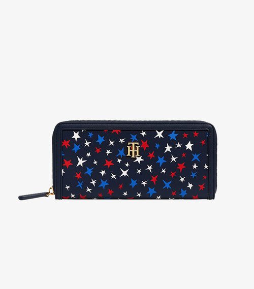 Tommy Hilfiger women's zip-around wallet in red white blue star print front view closed