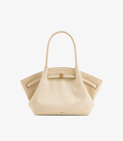 Front view of JW PEI Hana medium faux-suede tote bag with winged sides, dual handles and gold-tone clasp