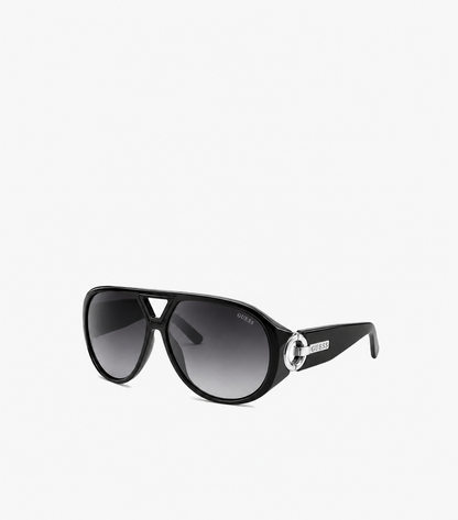 Angled view of Guess black aviator sunglasses showing wide temples, grey gradient lenses and polished silver G emblems