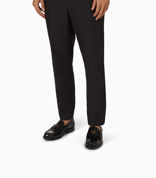 PRADA TRIANGLE LOGO LOAFERS IN BRUSHED LEATHER