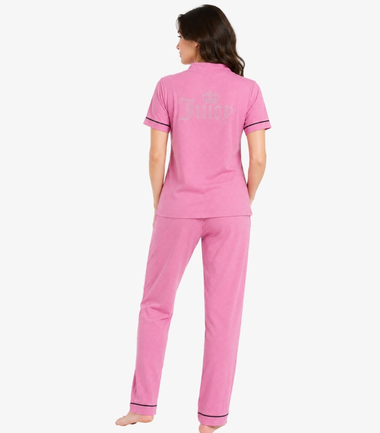 Juicy Couture pink pajama set back view showing rhinestone Juicy gothic script and crown logo on top with navy piping trim