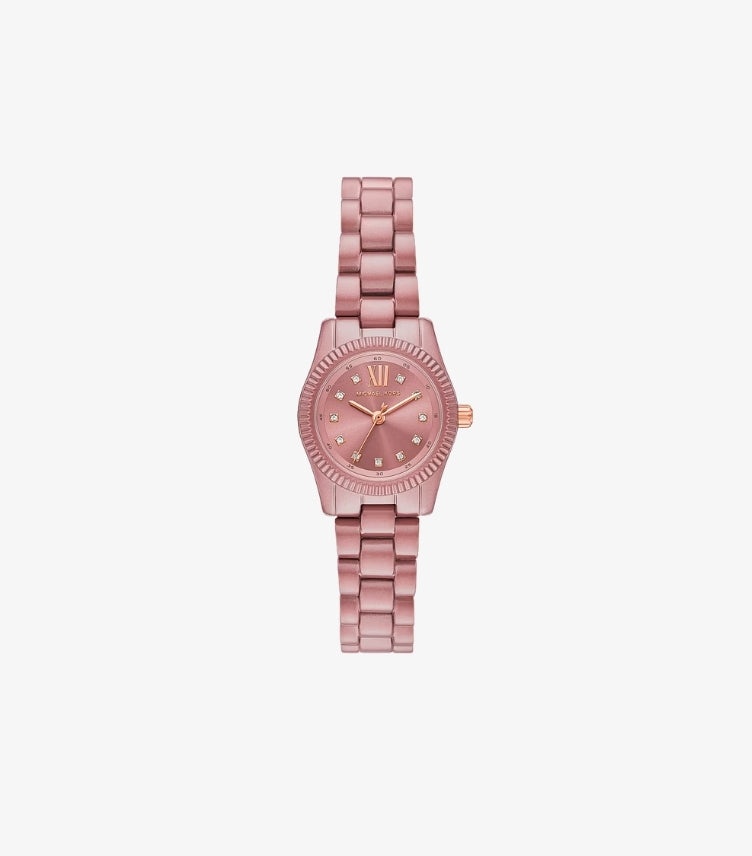 Front view of Michael Kors women’s limited-edition petite pink-tone stainless-steel watch with 26mm case, pavé indexes and rose gold-tone details