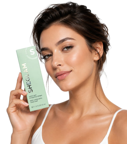 Female model holding SHEGLAM Good Grip Hydrating Primer 45ml box