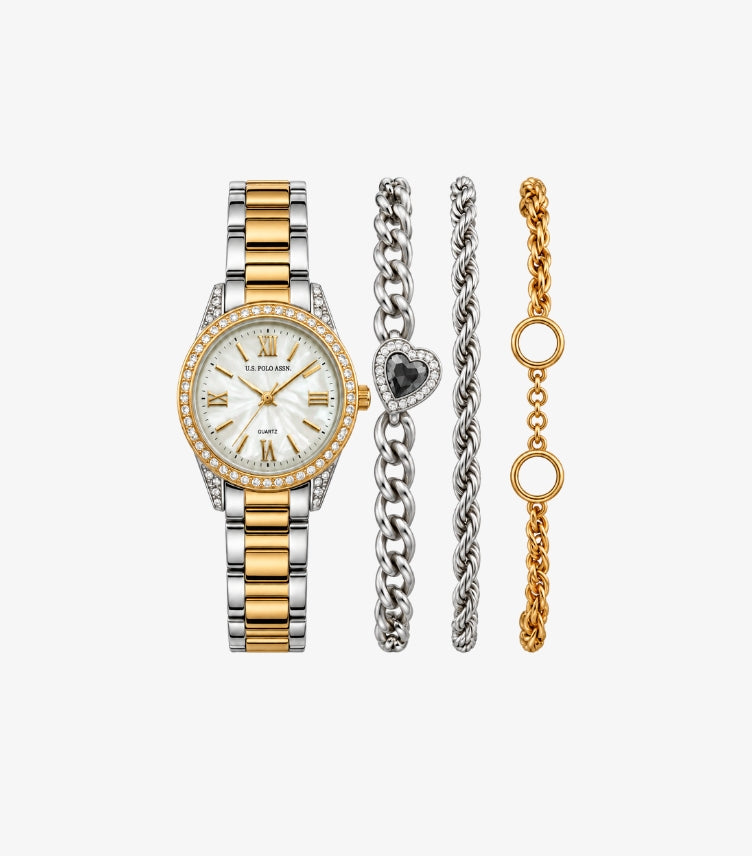 U.S. Polo Assn. women’s two-tone crystal-style quartz watch displayed with three coordinating silver-tone and gold-tone chain bracelets