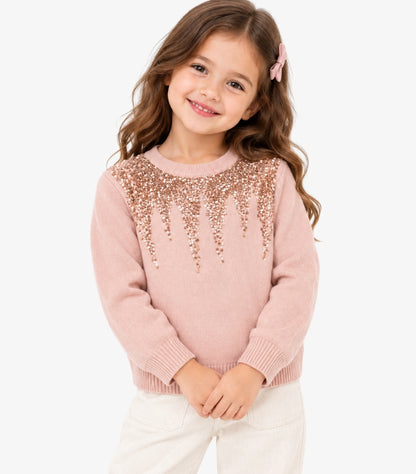 Girl wearing a Primark blush pink long-sleeve knitted jumper with cascading rose-gold-tone sequin embellishment