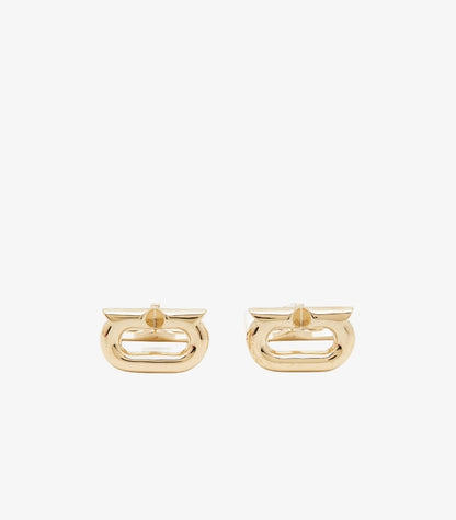 Front view of Ferragamo Gancini cufflinks featuring polished gold-tone open-centre logo designs