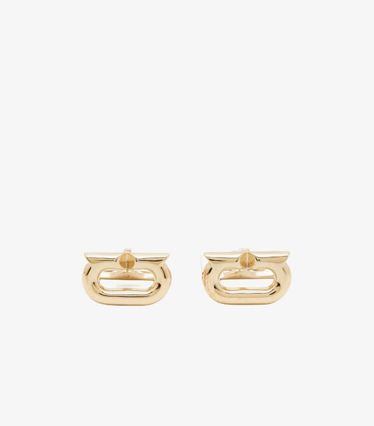 Front view of Ferragamo Gancini cufflinks featuring polished gold-tone open-centre logo designs