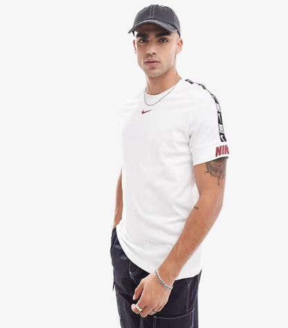 NIKE REPEAT LOGO T SHIRT IN WHITE