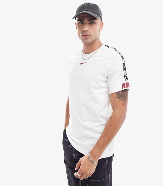 NIKE REPEAT LOGO T SHIRT IN WHITE