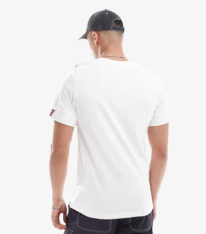 NIKE REPEAT LOGO T SHIRT IN WHITE