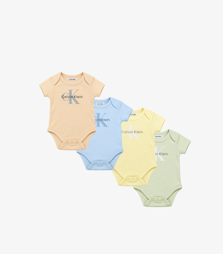 Calvin Klein baby 4-pack short sleeve bodysuits featuring beige, light blue, pastel yellow and sage green colours with CK logo prints and snap button closures.