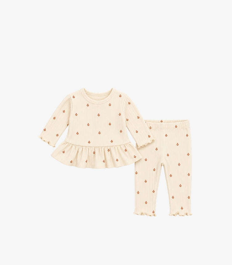 Carter's baby girls 2-piece outfit featuring a cream ribbed peplum top and matching leggings with small brown floral prints.