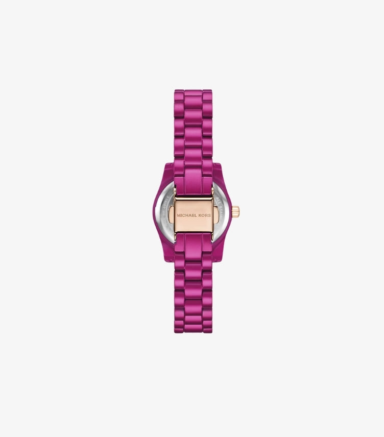 Back view of Michael Kors women’s pink-tone bracelet watch showing its branded rose gold-tone clasp
