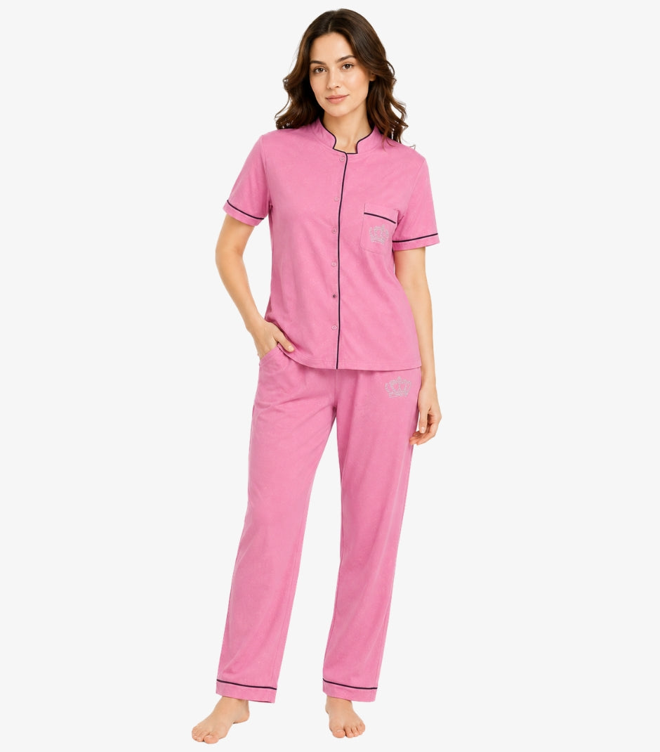 Juicy Couture pink pajama set front view showing mandarin collar button-down top with chest pocket crown logo and matching pants