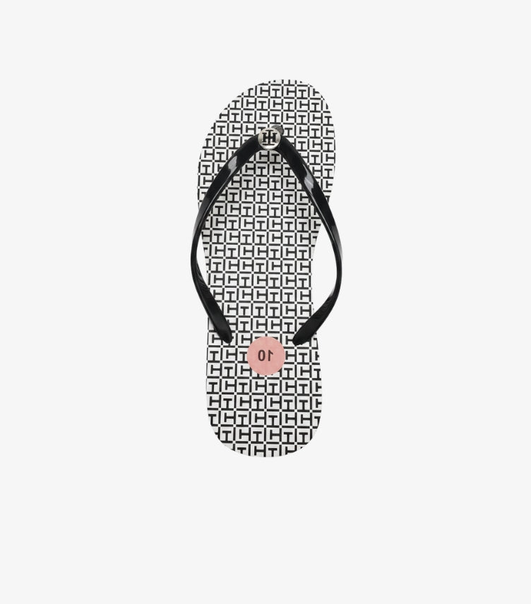 TOMMY HILFIGER WOMEN’S MONOGRAM FLIP FLOPS