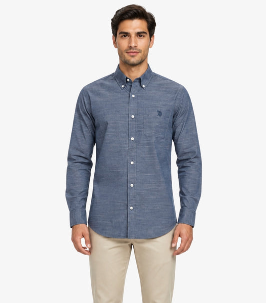 U.S. Polo Assn. men's blue Oxford button-down cotton shirt with long sleeves, embroidered chest logo, and chest pocket, front view.