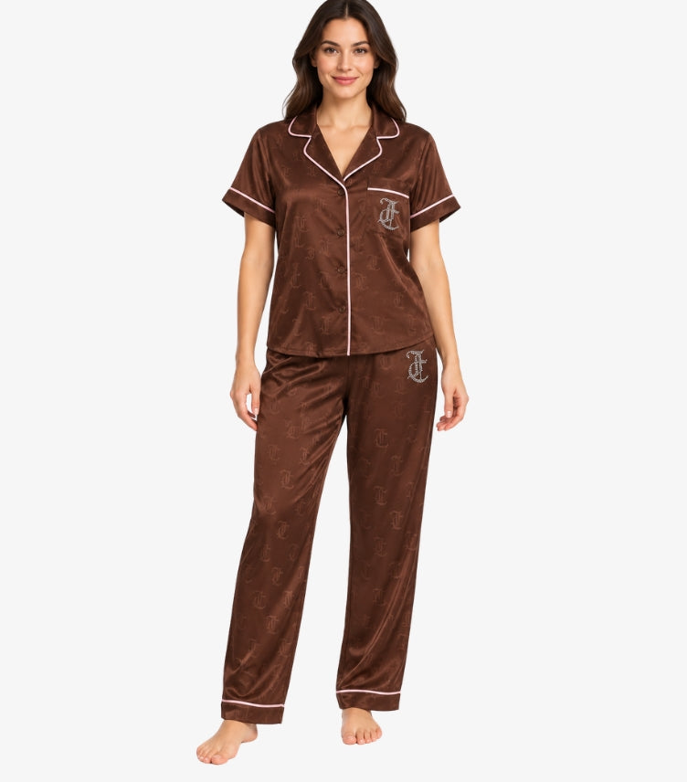 Juicy Couture Women's Brown Satin Pajama Set featuring a short-sleeve button-down shirt, matching full-length trousers, JC logo detailing and pink piping.