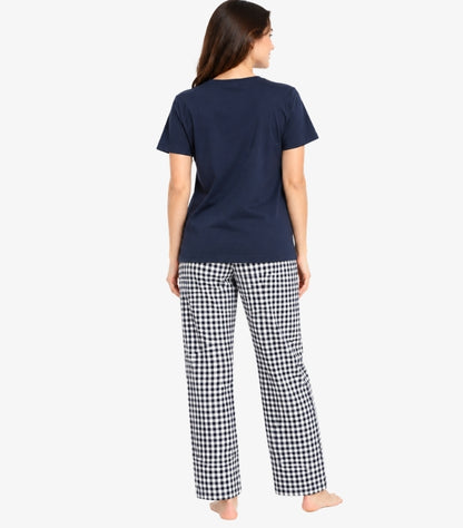 Back view of a model wearing a Marks & Spencer women’s short-sleeved pyjama top with check-pattern straight-leg bottoms