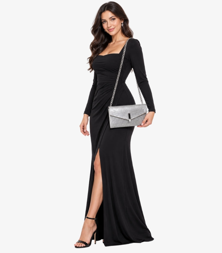Woman wearing an Aldo crystal-effect envelope clutch bag with a silver-tone crossbody chain strap