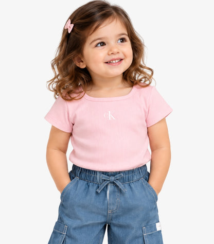 Close-up of Calvin Klein children’s pink CK logo T-shirt and blue elasticated-waist cargo trousers set