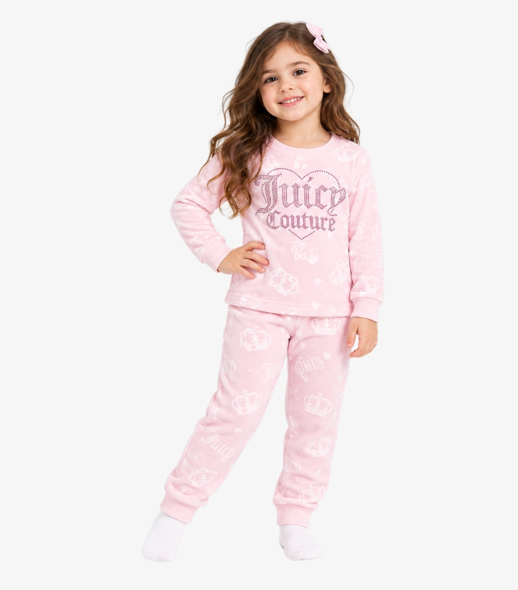 Young girl wearing Juicy Couture long sleeve logo top and matching printed joggers with elasticated waistband and ribbed ankle cuffs.