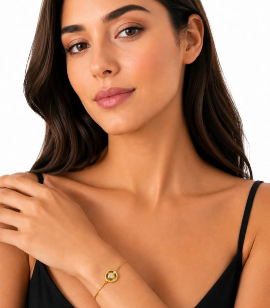 DKNY GOLD TONE CRYSTAL CHARM SLIDER BRACELET