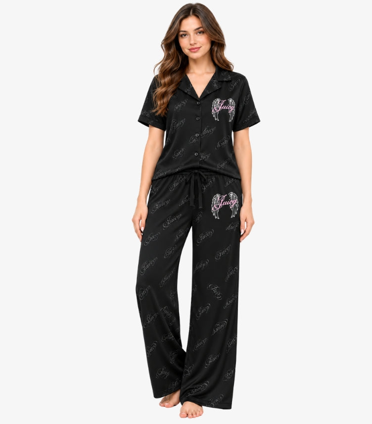Juicy Couture Women's Black Juicy Angel Pajama Set featuring a button-down short-sleeve shirt, pink angel wing logo, drawstring waist and matching wide-leg trousers.