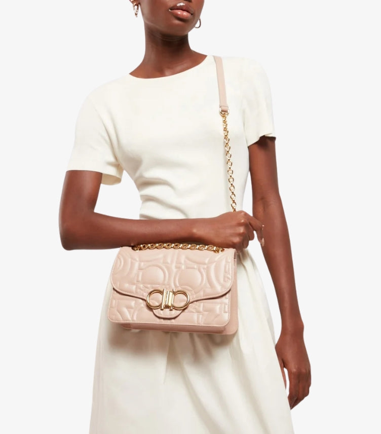 Ferragamo Gancini Quilted Shoulder Bag – model wearing crossbody with gold chain showing bag size and proportion | A&B Imported UK